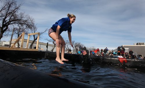 A contestant screams as she braces herself before jumping  into a BFI bin filled with icy, cold water at the Friendship Centre Saturday afternoon as part of the Polar Plunge, a fundraiser to raiser money for the special Olympics.   Feb 08,, 2014 Ruth Bonneville / Winnipeg Free Press