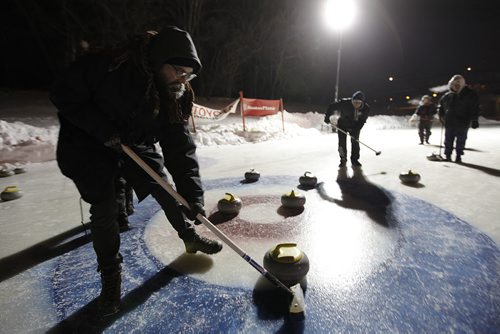 February 8, 2014 - 140208  -  Mitchell Braun of The Short And Curlies curls against the Tequila Shots at the 13th annual Ironman Outdoor Curling Bonspiel at The Forks in Winnipeg Saturday, February 8, 2014.  John Woods / Winnipeg Free Press