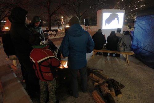 February 8, 2014 - 140208  -  People enjoy eight short films at the  the outdoor  at The Forks in Winnipeg Saturday, February 8, 2014.  John Woods / Winnipeg Free Press  February 8, 2014 - 140208  -  People enjoy a free outdoor screening of eight short films during the 6th annual Canadian Sport Film Festival at The Forks in Winnipeg Saturday, February 8, 2014.  John Woods / Winnipeg Free Press