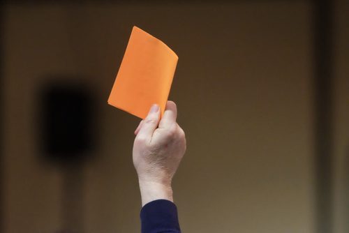 An NDP delegate holds up a ballot during a vote inside the annual Provincial NDP convention at Canad Inns Polo Park Sunday morning.   140209 - February 09, 2014 MIKE DEAL / WINNIPEG FREE PRESS