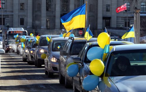 The Ukrainian Canadian Congress - Manitoba Provincial Council held an Auto-Maidan Car Rally through the streets of Winnipeg. Local Ukrainians rallied to raise awareness about the situation in Ukraine and showing solidarity with the Ukrainian people. The Auto-maidan movement in Ukraine, is one of the most visible expressions of public discontent with the regime. 140209 - February 09, 2014 MIKE DEAL / WINNIPEG FREE PRESS