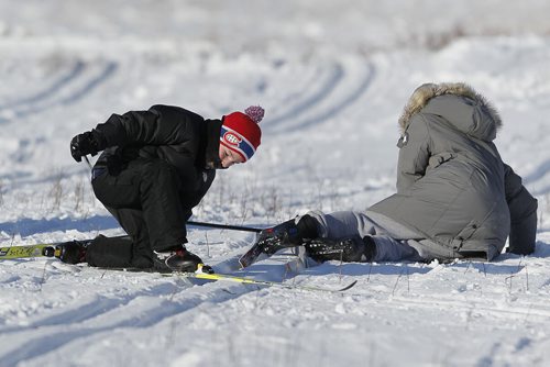 February 9, 2014 - 140209  -  Riley Dudych (L) and another skier take a spill at the fifth annual Snow Trek at Living Prairie Museum in Winnipeg Sunday, February 9, 2014. Participants came out and enjoyed cross-country skiing, snowshoeing, geocaching and snow art. John Woods / Winnipeg Free Press