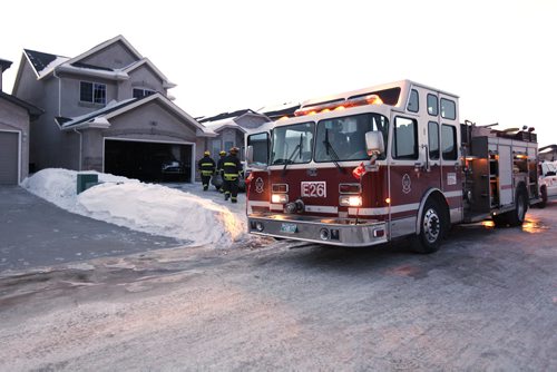 February 9, 2014 - 140209  -  Fire crews were called to a fire at 10 Hindle Gate in Winnipeg Sunday, February 9, 2014.  John Woods / Winnipeg Free Press