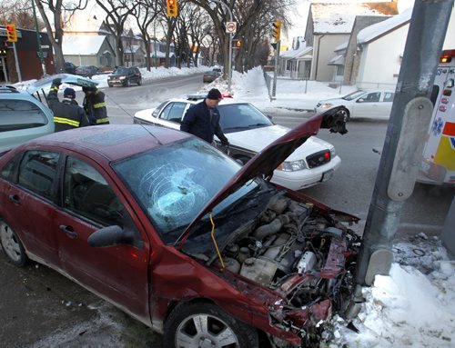Two vehicles collided at the Salter St. and Redwood Ave. intersection slowing traffic on the Monday morning commute.  The  occupants of the vehicles were checked out by Paramedics but not seriously injured.    Wayne Glowacki / Winnipeg Free Press Feb.10   2014