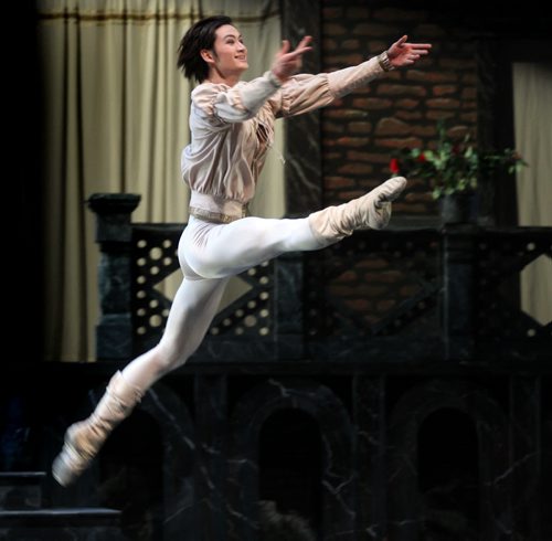Guest artist Liang Xing "Romeo" leaps to his "Juliet"  Amanda Green Tuesday evening during a rehearsal at the Centennial Concert Hall. The Royal Winnipeg Ballet production of Romeo and Juliet opens tomorrow. See release.  February 11, 2014 - (Phil Hossack / Winnipeg Free Press)