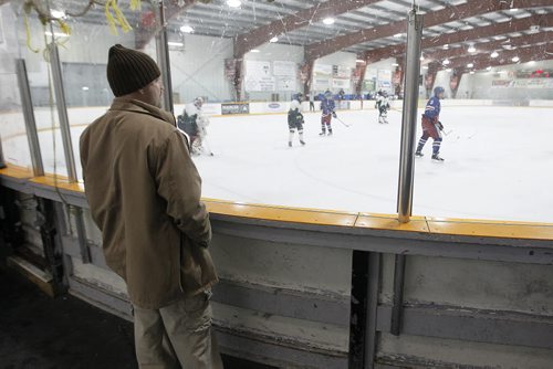 February 11, 2014 - 140211  -  Gary Ostrowski, a parent whose child plays hockey, comments on the plan to make parents take a behaviour course before their child can play hockey in Winnipeg Tuesday, February 11, 2014. John Woods / Winnipeg Free Press
