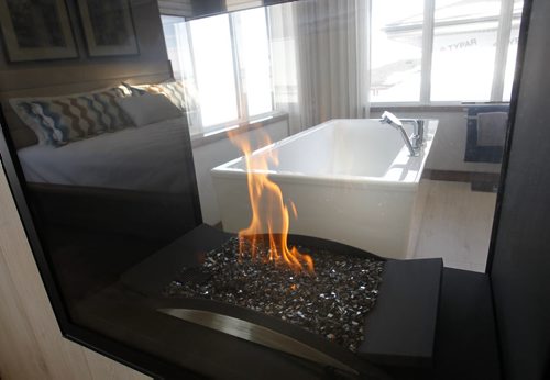 Homes. The fireplace beetween the master bedroom and the tub in the bathroom in the house at 28 Waterstone Drive in South Pointe. The Maric Homes sales rep. is Garrett Parker.   Todd Lewys story Wayne Glowacki / Winnipeg Free Press Feb. 12   2014