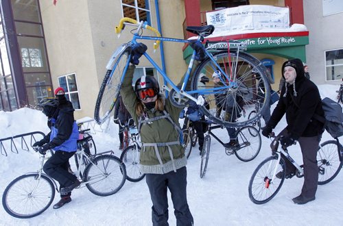 Sarah Thiessen from Winnipeg participates in the International Winter Cycling Congress. The event was a tour of places to eat in town. PLEASE SEE PRESS RELEASE . BORIS MINKEVICH/WINNIPEG FREE PRESS  Feb. 13/14