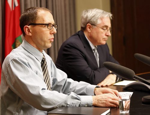 LtoR Glen Duizer  MB. Acting  chief veterinary officer and Andrew  Dickson GM Mb Pork  regarding discovery of porcine epidemic diarrhea found on a pig fram in the south east part of the province  FEB. 14 2014 / KEN GIGLIOTTI / WINNIPEG FREE PRESS