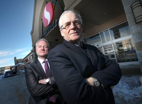 Doug Wiebe, general manager and Gordon Machej (right), president of Red River Co-op pose in front of the Grant Park Safewaqy, one of seveeral to be taken over by the member owned co-operative. See story. February 14, 2014 - (Phil Hossack / Winnipeg Free Press)
