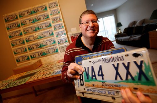 Manny Jacob, a member of the ALPCA, an international association of license plate collectors, and part of his collection, Friday, February 14, 2014. (TREVOR HAGAN/WINNIPEG FREE PRESS) - for 49.8 intersection dave sanderson piece.