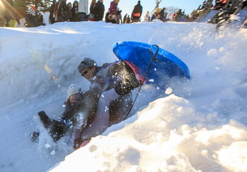 Tobogganers lose their sleds at Festival Du Voyageur snow park on Louis Riel Day. 140217 - Monday, {month name} 17, 2014 - (Melissa Tait / Winnipeg Free Press)