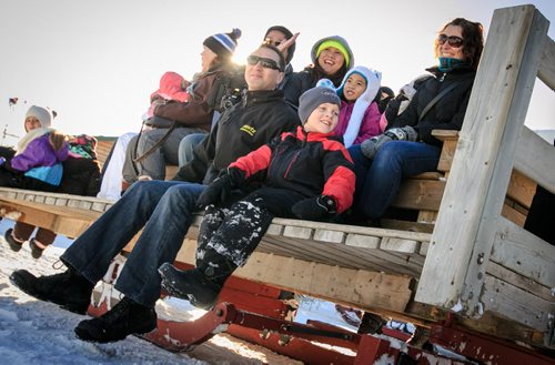 Passengers enjoy a sleigh ride at Festival Du Voyageur on Louis Riel Day. 140217 - Monday, {month name} 17, 2014 - (Melissa Tait / Winnipeg Free Press)
