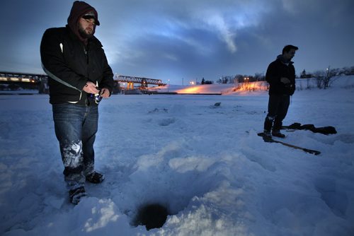 February 17, 2014 - 140217  -  Dan and Mark Stine were out taking advantage of a free ice fishing weekend in Manitoba at Lockport Monday, February 17, 2014. John Woods / Winnipeg Free Press
