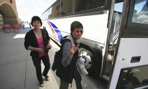 John Woods / Winnipeg Free Press / June 16/07- 070616  - Julie Sininig (R) and her friend Isabel Catacutan took a bus tour to shop in Grand Forks June 16/07.  The high Canadian dollar seems to be encouraging shoppers to head south for some bargains.