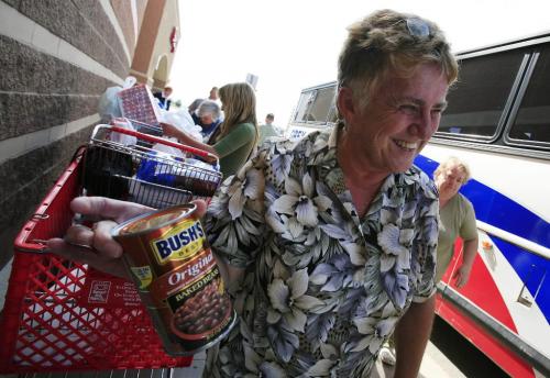 John Woods / Winnipeg Free Press / June 16/07- 070616  - Shirley Goerzen organised a bus full of shoppers to Grand Forks June 16/07.    She is holding the big purchase for her, Bush's Baked Beans.  The high Canadian dollar seems to be encouraging shoppers to head south for some bargains.