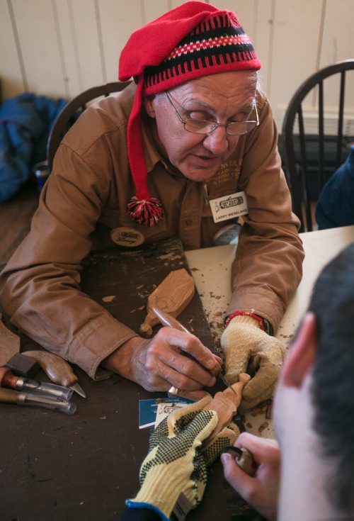 Larry Weselake instructs workshop attendees on woodworking at Festival Du Voyageur. (story for 49.8 by Connie) 140217 - Monday, {month name} 17, 2014 - (Melissa Tait / Winnipeg Free Press)