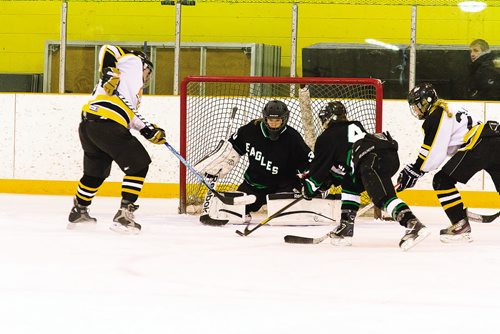 Canstar Community News (07/02/2014)- Stephanie Caryk is goalie for the Sir John's-Ravencourt Eagles. The Glenlawn student plays for the Eagles because there were no goalies for the team. She was named athlete of the week by the Winnipeg Women's High School Hockey League.  (STEPHCROSIER/CANSTAR)