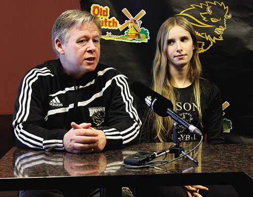 Canstar Community News (05/02/2014)- UofM Bisons Women's Volleyball coach Ken Bentley with digger Caleigh Dobie. (STEPHCROSIER/CANSTARNEWS)