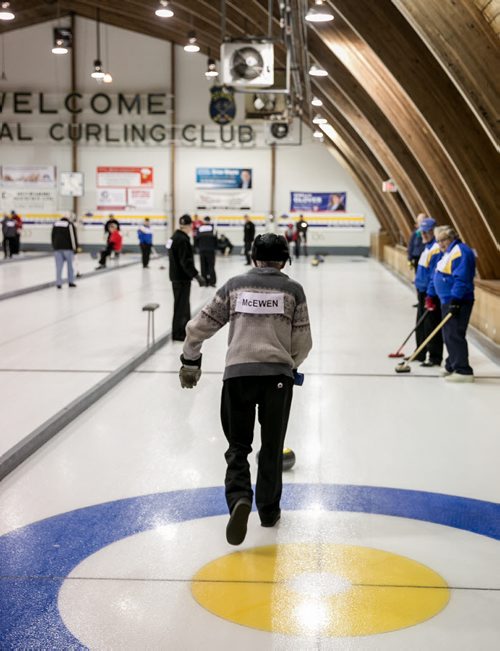 Jean Chamberlain of the St. Vital Retired Men's Curling Club wearing Dawn McEwen's name on his back in honour of her Olympic gold medal win at Sochi 2014.  140220 - Thursday, {month name} 20, 2014 - (Melissa Tait / Winnipeg Free Press)