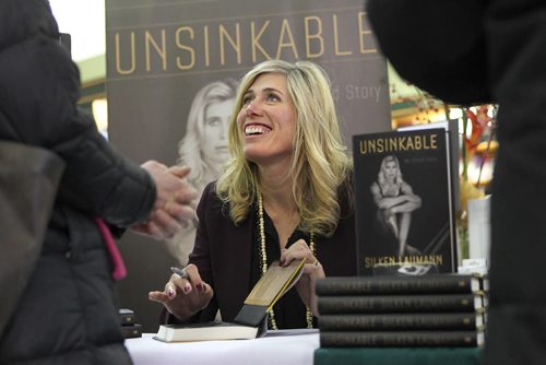 Silken Laumann, a three-time Olympic medalist,  shares her smile with her fans as she signs copies of her new book, ÄúUnsinkable: A MemoirÄù at McNally Robinson Booksellers at Grant Park Shopping Centre Thursday afternoon.  Feb 20,, 2014 Ruth Bonneville / Winnipeg Free Press