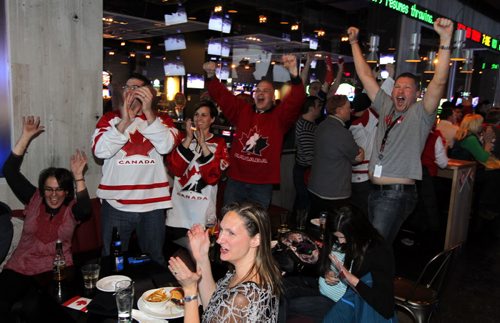 Shark Club in City Place was a popular place to cheer on Team Canada as they played Team U.S.A in the mens hockey semifinals at the Olympics. BORIS MINKEVICH / WINNIPEG FREE PRESS  Feb. 21/14