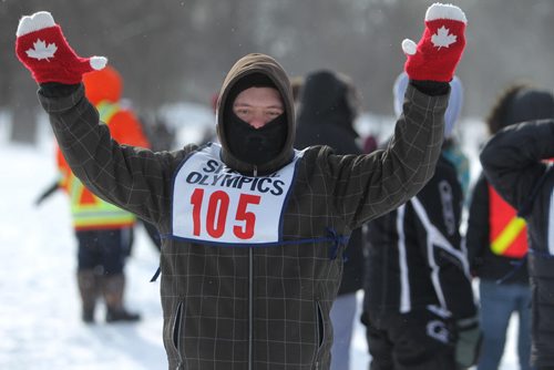 Action art  of David Cheyne as he makes his way over the finish line while  competing in Special Olympics  100m snowshoeing at 2014 Special Olympics Winter Games held at St. John's Ravesncourt Saturday.  See Prest story.  Training Basket.   Feb 22,, 2014 Ruth Bonneville / Winnipeg Free Press