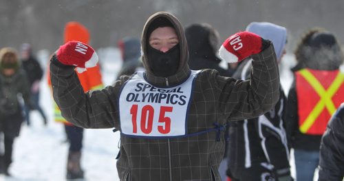 Action art  of David Cheyne after he makes his way over the finish line while  competing in Special Olympics  100m snowshoeing at 2014 Special Olympics Winter Games held at St. John's Ravesncourt Saturday.  See Prest story.  Training Basket.   Feb 22,, 2014 Ruth Bonneville / Winnipeg Free Press