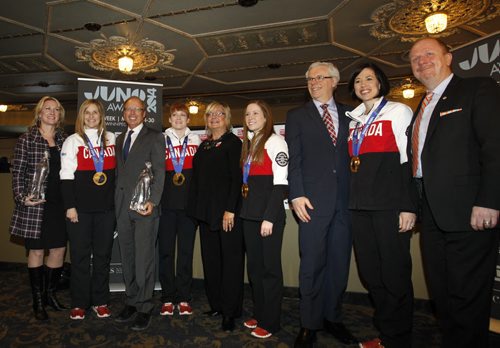 After the news conference to announce the JUNO  Week details at the Metropolitan Entertainment Centre Tuesday morning the speakers pose with Olympic gold medalists Team Jones. From left, Melanie Berry, president & CEO, CARAS/The JUNO Awards, Jennifer Jones, Mayor Sam Katz,  Dawn McEwen, Carole Vivier 2014 JUNO Host Committee Co-Chair,  Kaitlyn Lawes, , Premier Greg Selinger, Jill Officer and Kenny Boyce, 2014 JUNO Host Committee Co-Chair. Wayne Glowacki / Winnipeg Free Press Feb. 25   2014