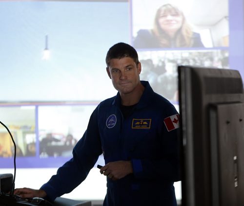 Stdup -One of CanadaÄôs newest astronauts will share the inspirational story of his path from farm boy to future rocket man, in a presentation to a group of science and technology students at Sisler High School on Thursday, February 27.Jeremy Hansen, 38, is the former CF-18 fighter pilot the Canadian Space Agency chose in 2009 as one of two members of the third Canadian Astronaut selection. Hansen is preparing to follow in the footsteps of fellow Canadian astronauts such as Chris Hadfield, the recently retired International Space Station Commander who captivated the world last year with his social media photos and reports from space. Sisler High School will also be making the presentation available to Grade 7 to 12 students in northern Manitoba through a live video link ( students  and presentation  on background screen) to participating schools in the Frontier School Division, including West Lynn Heights School in Lynn Lake. Students from  Andrew Mynarski V.C. Junior High School, Prairie Rose School and Isaac Newton School in the Winnipeg School Division will also view the presentation via the live video link. FEB. 27 2014 / KEN GIGLIOTTI / WINNIPEG FREE PRESS