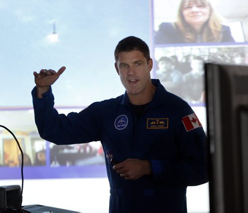 Stdup -One of CanadaÄôs newest astronauts will share the inspirational story of his path from farm boy to future rocket man, in a presentation to a group of science and technology students at Sisler High School on Thursday, February 27.Jeremy Hansen, 38, is the former CF-18 fighter pilot the Canadian Space Agency chose in 2009 as one of two members of the third Canadian Astronaut selection. Hansen is preparing to follow in the footsteps of fellow Canadian astronauts such as Chris Hadfield, the recently retired International Space Station Commander who captivated the world last year with his social media photos and reports from space. Sisler High School will also be making the presentation available to Grade 7 to 12 students in northern Manitoba through a live video link ( background screen) to participating schools in the Frontier School Division, including West Lynn Heights School in Lynn Lake. Students from  Andrew Mynarski V.C. Junior High School, Prairie Rose School and Isaac Newton School in the Winnipeg School Division will also view the presentation via the live video link. FEB. 27 2014 / KEN GIGLIOTTI / WINNIPEG FREE PRESS