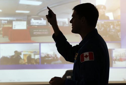 Stdup -One of CanadaÄôs newest astronauts will share the inspirational story of his path from farm boy to future rocket man, in a presentation to a group of science and technology students at Sisler High School on Thursday, February 27.Jeremy Hansen, 38, is the former CF-18 fighter pilot the Canadian Space Agency chose in 2009 as one of two members of the third Canadian Astronaut selection. Hansen is preparing to follow in the footsteps of fellow Canadian astronauts such as Chris Hadfield, the recently retired International Space Station Commander who captivated the world last year with his social media photos and reports from space. Sisler High School will also be making the presentation available to Grade 7 to 12 students in northern Manitoba through a live video link to participating schools in the Frontier School Division, including West Lynn Heights School in Lynn Lake. Students from  Andrew Mynarski V.C. Junior High School, Prairie Rose School and Isaac Newton School in the Winnipeg School Division will also view the presentation via the live video link ( on background screen). FEB. 27 2014 / KEN GIGLIOTTI / WINNIPEG FREE PRESS