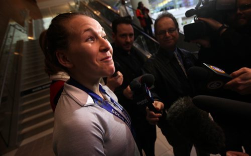 Jocelyne Larocque, arriving at the James Richardson International Airport, reacts to questions in Winnipeg Thursday afternoon. See Mary Agnes Welch story re: Olympic Gold. February 27, 2014 - (Phil Hossack / Winnipeg Free Press)