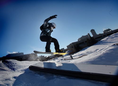 Fifteen year old Addie Prentice does a ump at the snowboard hill at the Forks Saturday afternoon.  He admits that it is cold but not so bad if you bundle up for it.  Standup  March 01, 2014 Ruth Bonneville / Winnipeg Free Press