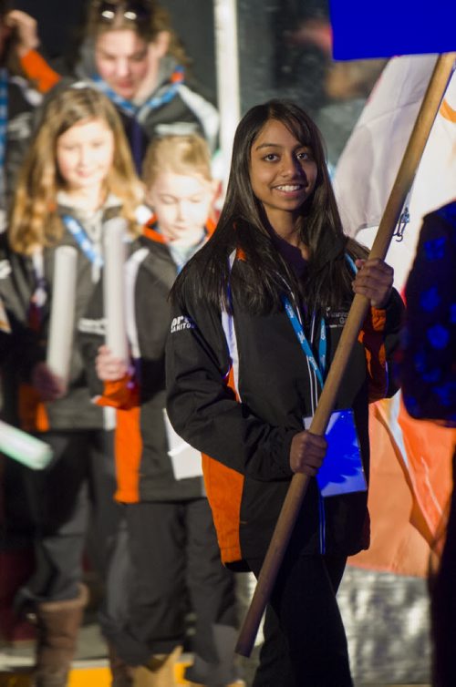 140302 Winnipeg - DAVID LIPNOWSKI / WINNIPEG FREE PRESS - March 02, 2014  Westman flag bearer Nicole Russel (age 13) enters the arena for the opening ceremonies of the 2014 Power Smart Manitoba Games  in Morden, MB Sunday night.