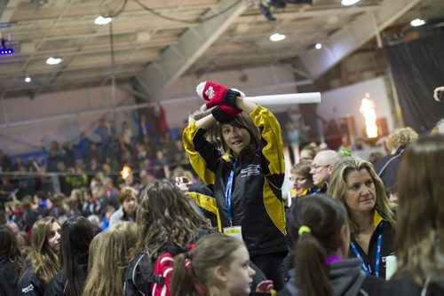 140302 Winnipeg - DAVID LIPNOWSKI / WINNIPEG FREE PRESS - March 02, 2014  Athletes cheer and wave flags during the opening ceremonies of the 2014 Power Smart Manitoba Games in Morden, MB Sunday night.