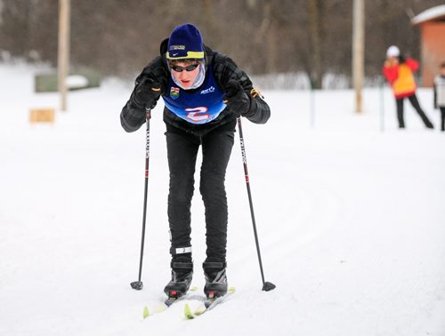 Jesse Bachinsky, 15, pushes to the finish line of the 7.5km male juvenile cross country ski race, as part of the 2014 Power Smart Manitoba Winter Games at Birch Ski Area in Roseisle, MB. Bachinsky is thought to be the first ever visually impaired athlete to compete in cross country skiing at the Manitoba Games. 140303 - Monday, {month name} 03, 2014 - (Melissa Tait / Winnipeg Free Press)