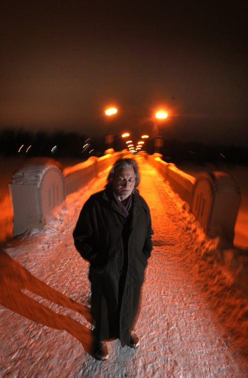 Alden Wiebe stands in front of te Assinaboine Park pedestrian bridge Monday night. He jumped off the bridge in a desperate attempt to escape his problems while homeless in 2012. See Randy Turner story. March 3, 2014 - (Phil Hossack / Winnipeg Free Press)