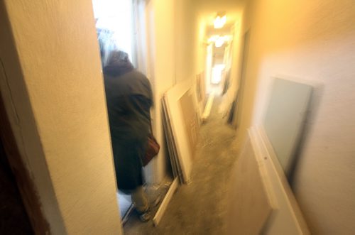Formerly homeless, Alden Wiebe makes his way into the small Ellice ave apartment he shares with a partner. The building is literally being renovated around them. See Randy Turner story. March 3, 2014 - (Phil Hossack / Winnipeg Free Press)