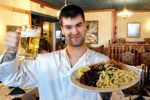 Jereme Labelle owner and head chef at Gasthaus Gutenberger with the Bratwurst Appetizer and the Platter of Schnitzels.  140304 March 4, 2014 Mike Deal / Winnipeg Free Press