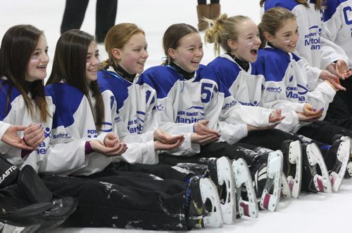Silver metalist ringette team from  Interlake all smiles as they wait for their medals at  The 2014 Morden Stanley Winkler Power Smart Manitoba Games Wednesday being held in Winkler/Morden- The games wrap up Mar 08-   Standup photo- Mar 05, 2014   (JOE BRYKSA / WINNIPEG FREE PRESS)