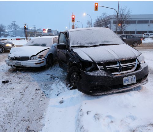Stdup Fresh snow conditions with mild temps have doubled stopping distances  even a slow speeds . This two car MVC  at Stafford S. At Taylor Ave  mirrors several similar mvc's around the city .Mar. 6 2014 / KEN GIGLIOTTI / WINNIPEG FREE PRESS