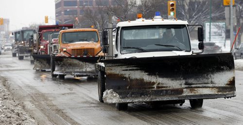 Stdup , Portage Ave ,Snow Ploughs out in force  to deal with new a snow fall  as well as remnants of several past ones . Mar. 6 2014 / KEN GIGLIOTTI / WINNIPEG FREE PRESS