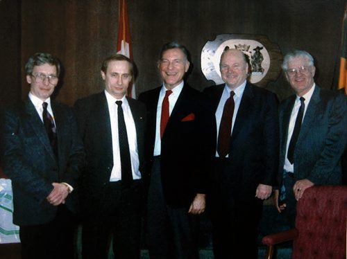Harry Giesbrecht (far right) poses with dignitaries including Putin. Harry worked closely with Russian President Vladimir Putin in the Soviet Union. He and his wife sponsored a visit to Canada and escorted him around. (Harry and Manja both denied saying this while I was there. March 6, 2014 - (Phil Hossack / Winnipeg Free Press)