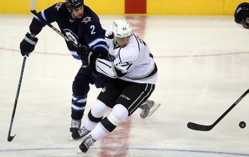 Winnipeg Jet Adam Paardy deflects Los Angeles King Jordan Nolan in first period action at the MTS Center Thursday. See story. March 6, 2014 - (Phil Hossack / Winnipeg Free Press)