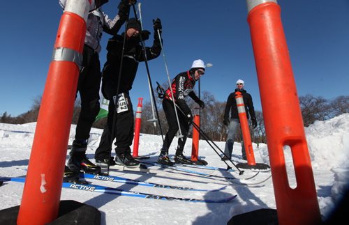 Participants in the  first annual Wind Chill Race Series at Assiniboine Park Saturday morning get ready to cross country ski after already completing the running and cycling events. Next week (Saturday March 15 ) is the second in the series and is the only qualifying race in Canada for the 2015 Winter Triathlon World Championships.  Standup photo  March 08, 2014 Ruth Bonneville / Winnipeg Free Press