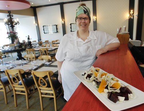 Restaurant Review  of the Tre Visi Cafe.  Co-owner Heather Neskar with the Agro-Dolce (beet salad). Marion Warhaft story     Wayne Glowacki / Winnipeg Free Press March 10   2014