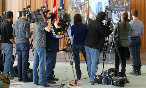 Media Availability on Frozen Pipes. Mayor Sam Katz(in photo talking to a wall of cameras) and Randy Hull, Emergency Preparedness Coordinator answer questions in the Mayors Foyer. BORIS MINKEVICH / WINNIPEG FREE PRESS  March 10, 2014
