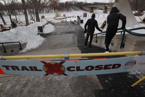 Two renegade skaters take to the ice at the Forks Tuesday even after the main river trail was closed for the season-( They refused to give names)    Standup photo- Feb 11, 2014   (JOE BRYKSA / WINNIPEG FREE PRESS)