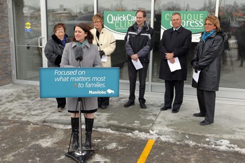 QUICKCARE CLINICS - Initiatives to help ensure all Manitobans have access to a family doctor by 2015 and location of a new QuickCare Clinic. In front of future clinic. Health Minister Erin Selby addresses the media. BORIS MINKEVICH / WINNIPEG FREE PRESS  March 11, 2014